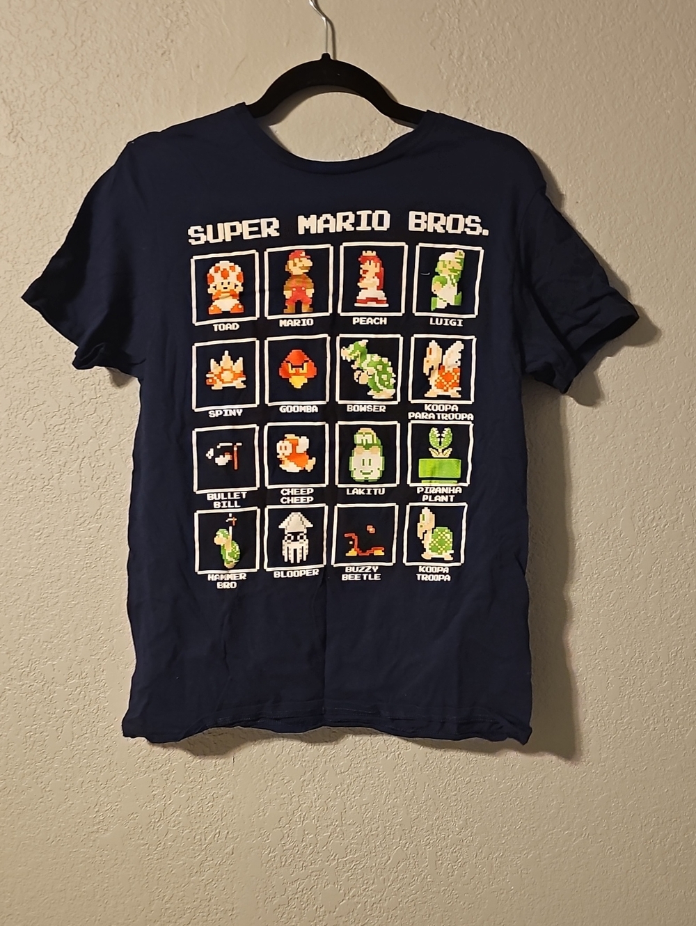 Super Mario Bros. Navy Pixel Character Grid Short Sleeve Tee